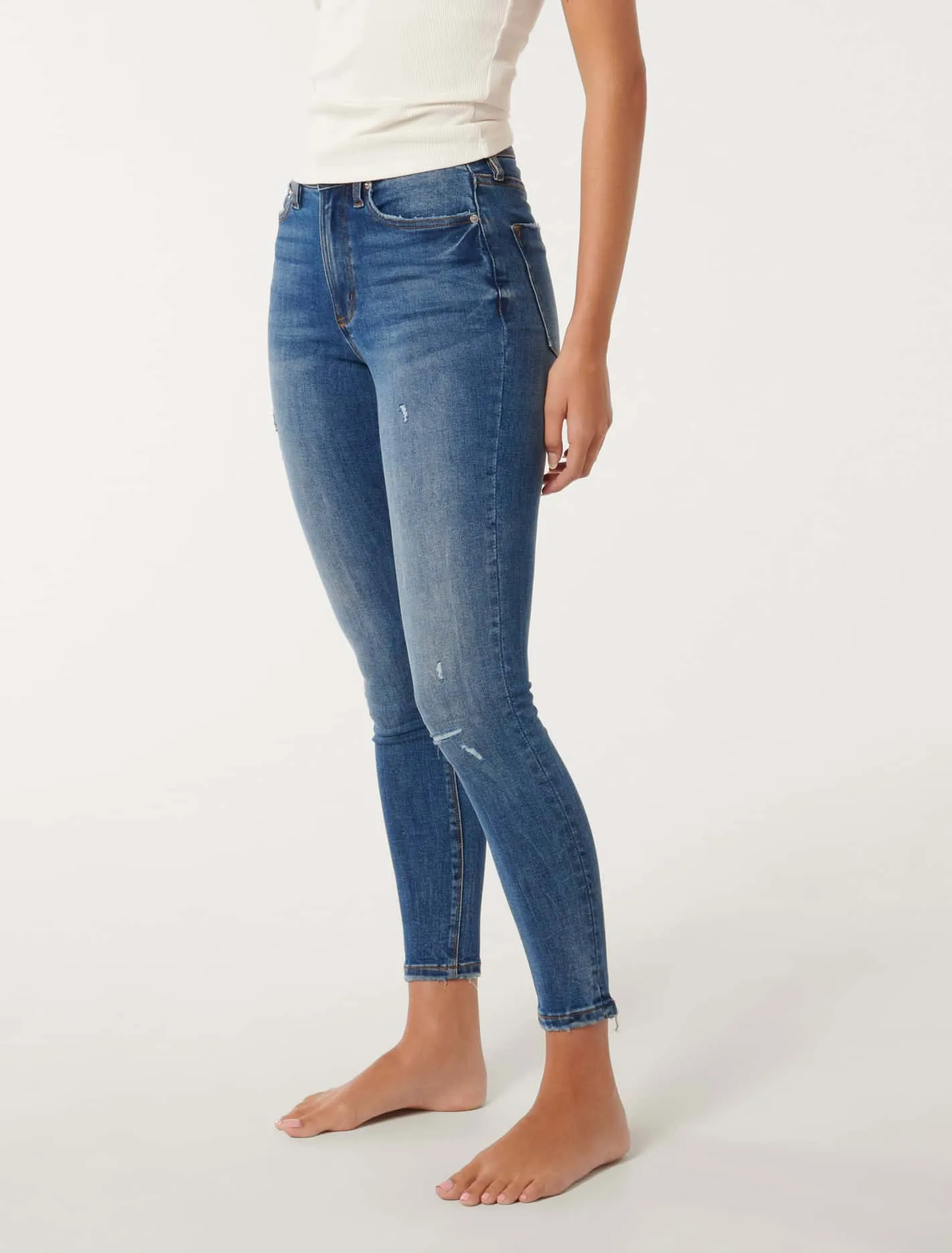 Nala Mid-Rise Skinny Jeans